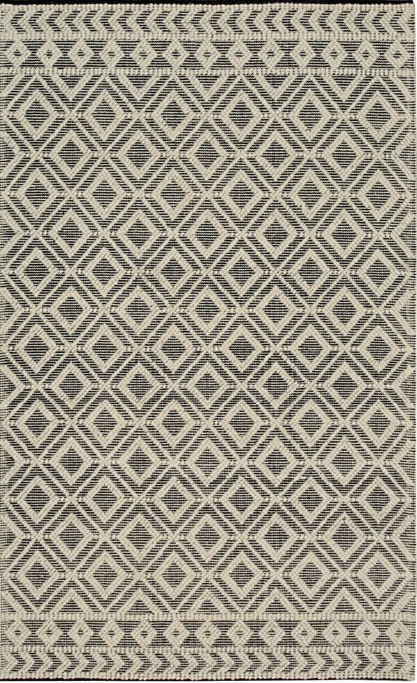 Black and ivory rug featuring a repeating geometric diamond pattern and decorative woven borders.