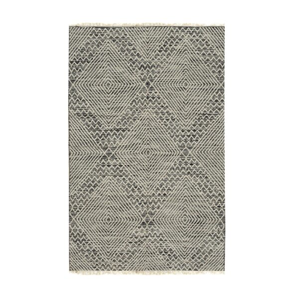 Black and white geometric patterned rug with textured diamonds and short tassels on the ends.