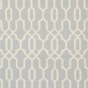 Light blue flatweave rug with a repeating cream-colored geometric trellis design.