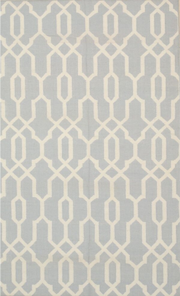 Light blue flatweave rug with a repeating cream-colored geometric trellis design.