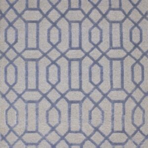 Gray and dusty blue rug showcasing a dimensional geometric trellis fretwork design and short fringe.