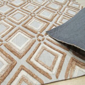 Beige and brown textured diamond rug folded back to show a gray backing on a light wood floor.