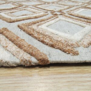 Raised cream and brown diamond patterns contrast with a flat gray background, visible atop light wood flooring.