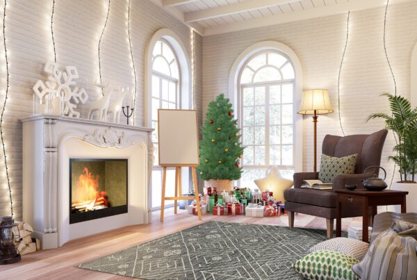 A low-pile gray runner with thin white geometric lines sits on wood flooring in a festive living room.