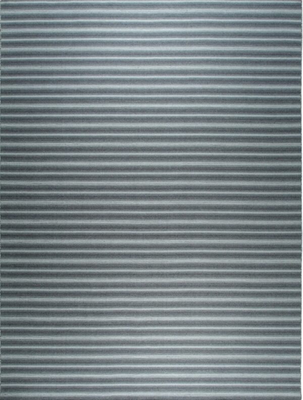 A rectangular rug displays horizontal stripes in shades of gray, teal, and off-white.