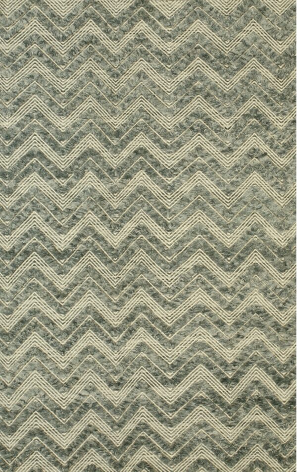 Textured high-pile rug featuring light beige zigzag patterns over a shaggy grayish-green background.