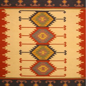 Tan and red flatweave rug with navy borders and central stepped-diamond geometric patterns.