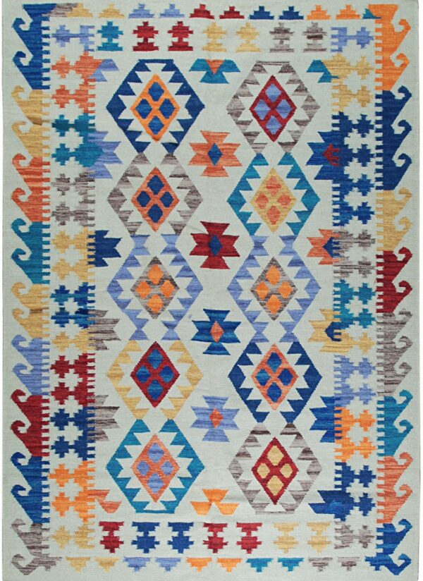 Geometric flatweave rug featuring blue, orange, red, and yellow diamonds on a pale gray background.