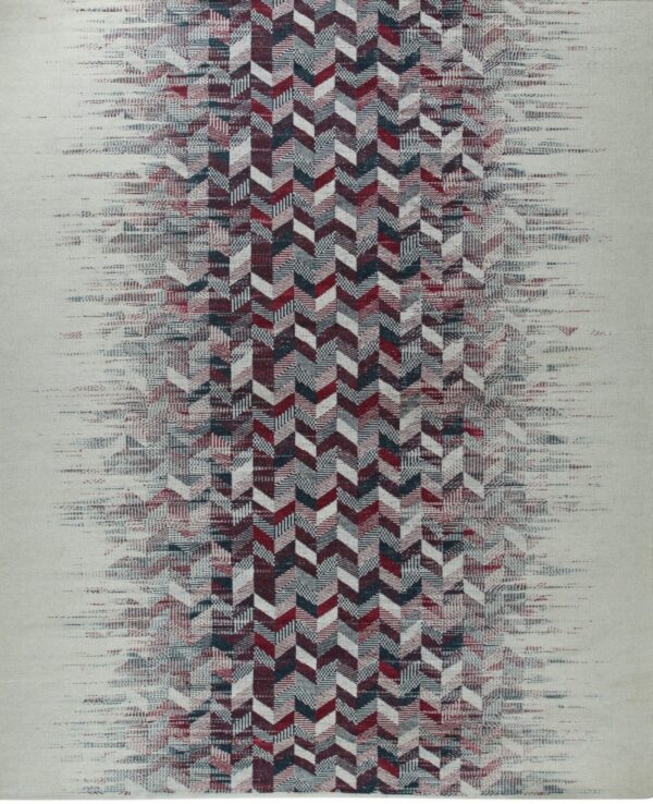 Low-pile rug with a chevron pattern in burgundy, blue, and gray that fades into a light background.