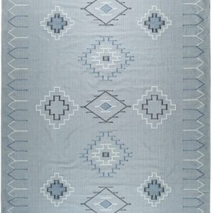 Light blue flatwoven rug with contrasting white and blue geometric patterns and tassels on the short ends.
