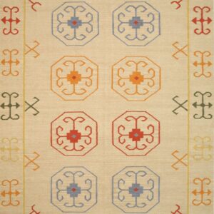 A flatweave beige rug with blue, red, orange, and yellow geometric medallions and patterned borders.