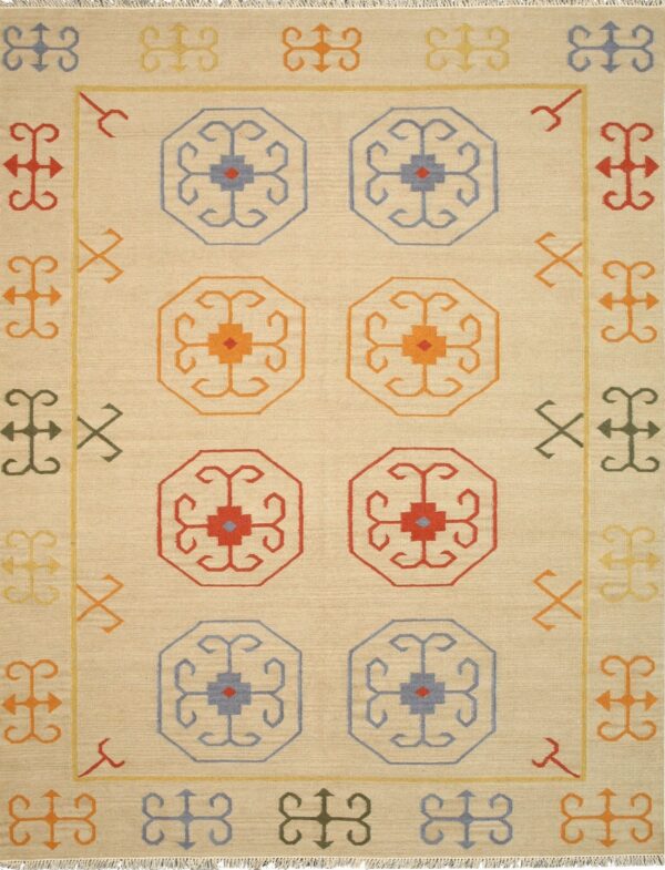 A flatweave beige rug with blue, red, orange, and yellow geometric medallions and patterned borders.