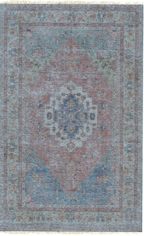 Muted traditional rug featuring a distressed medallion in rust, teal, and blue, with short white fringes.