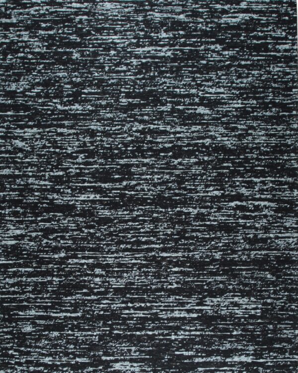 Highly textured black and white rug showing horizontal streaks and speckled lines.