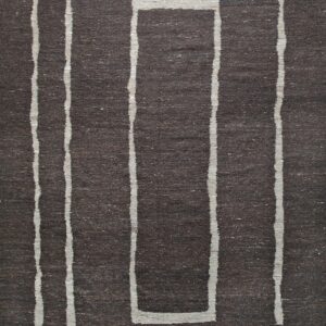 Textured dark brown rug patterned with irregular light gray vertical lines and a central rectangle outline.