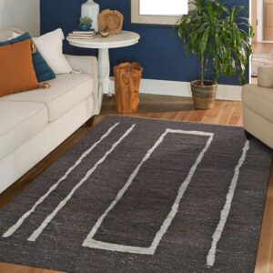 Dark heathered rug featuring light gray abstract stripes and a frame pattern grounds a blue living room.