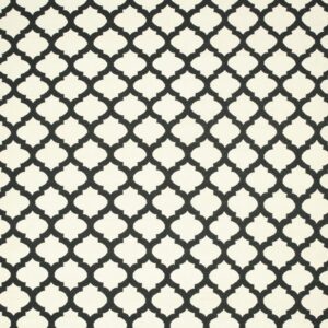 Black quatrefoil lattice pattern on a creamy white, medium pile rug.