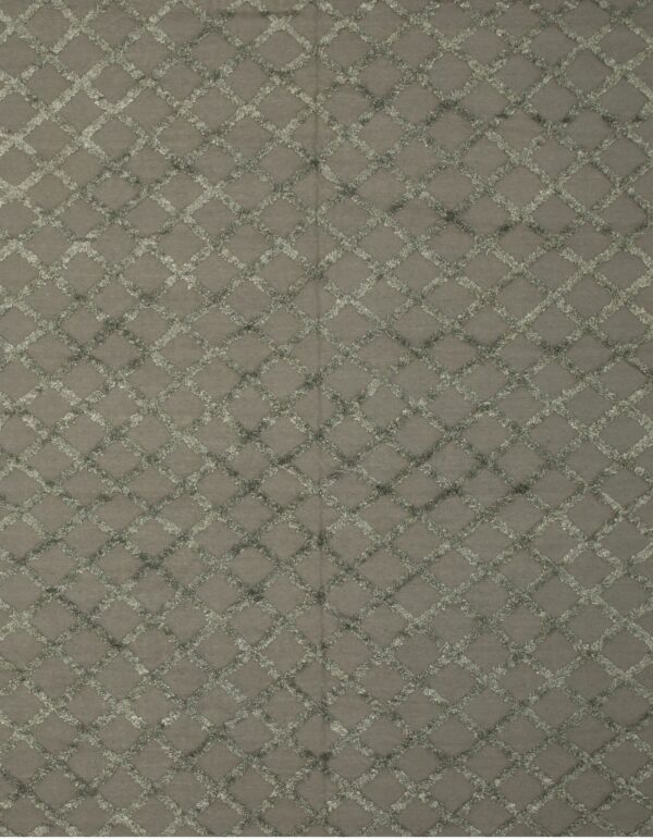 Earthy taupe rug displaying an overall diamond pattern with shaggy, raised lines.
