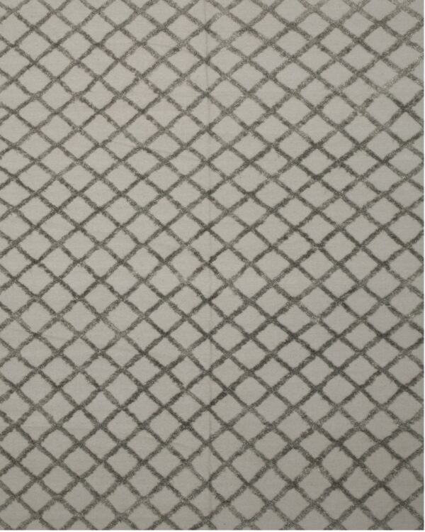 Light beige rug featuring a raised dark gray shaggy diamond trellis pattern.