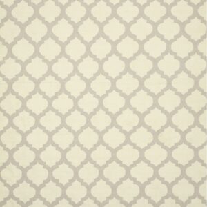 A full view rug features an all-over gray quatrefoil pattern on a light ivory or cream background.