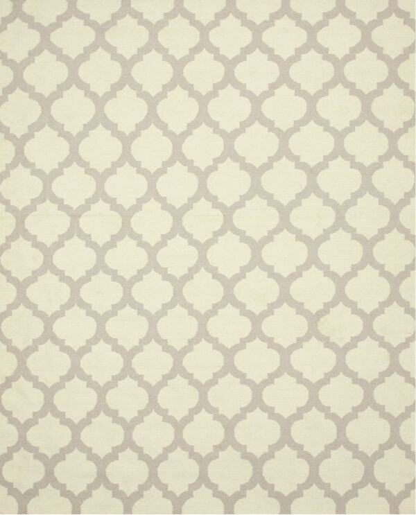 A full view rug features an all-over gray quatrefoil pattern on a light ivory or cream background.