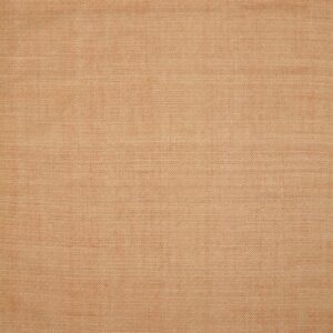 Burnt orange flatwoven rug displaying a dense, repeating pattern of small contrasting diamonds.