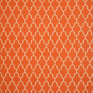 Orange rug with a repeating lattice geometric pattern outlined in off-white.