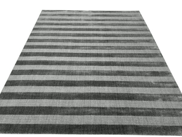 Area rug featuring alternating broad horizontal stripes in charcoal gray and light gray tones.