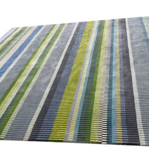 Textured rug featuring narrow vertical stripes of blue, green, yellow, and multiple shades of gray.