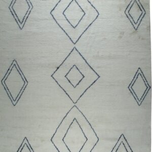 Cream textured rug with dark blue outlined geometric diamonds and short visible fringe.