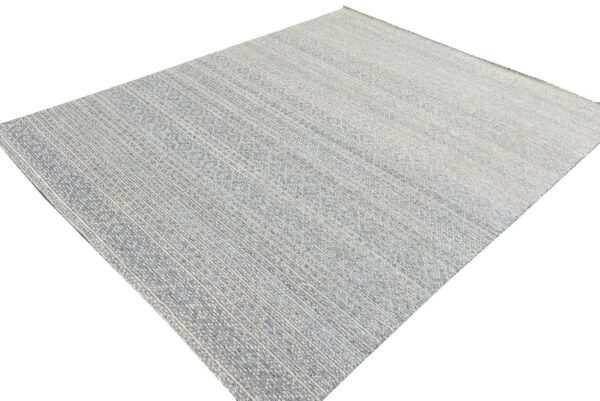 Speckled gray and white rug with thin vertical stripes displayed against a bright white background.