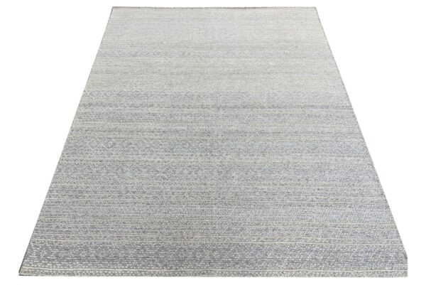 Textured low-pile rug featuring horizontal light blue and cream striped bands with subtle internal geometric patterns.