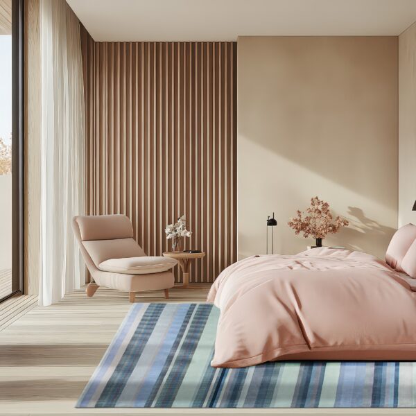 Striped blue rug anchors a bright, modern bedroom featuring light wood floors and blush textiles.
