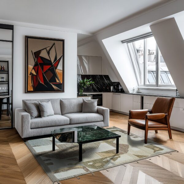 Low-pile abstract rug in neutral and olive tones beneath a coffee table, gray sofa, and leather chair.
