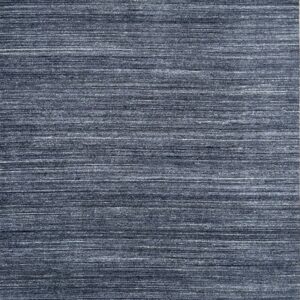 Textured indigo low-pile rug with dense horizontal striations of dark blue and light gray fibers.