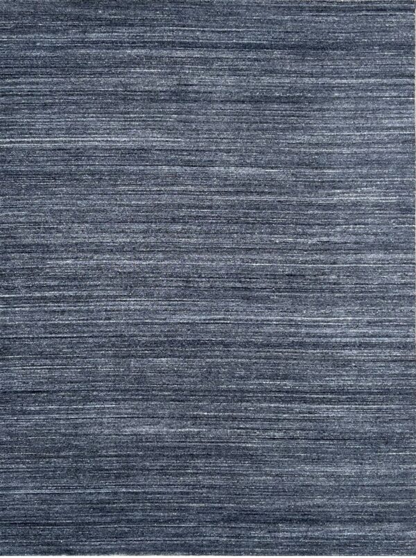 Textured indigo low-pile rug with dense horizontal striations of dark blue and light gray fibers.