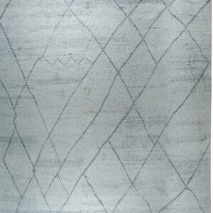 Pale blue shaggy rug with an irregular dark gray diamond trellis pattern and short white fringe.