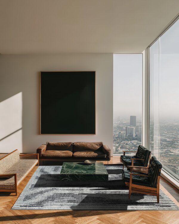 A striped gray rug grounds a modern seating area with a marble table and expansive cityscape view.