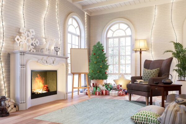 Blue and white flatweave rug featuring a herringbone pattern on light hardwood flooring in a festive room.