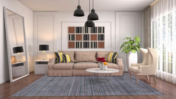 Slate blue and gray chunky textured rug grounding a neutral contemporary living room with wood floors.