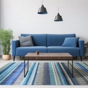 Blue and gray striped rug in a modern living room with a bright blue couch and white walls.