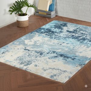 Abstract blue and beige rug rests on parquet wood floors in a room with white brick walls.