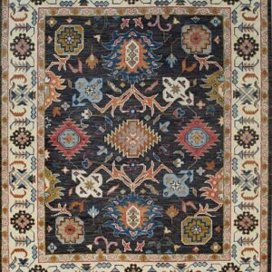 Dark gray area rug featuring a traditional multicolored pattern and ivory floral borders.