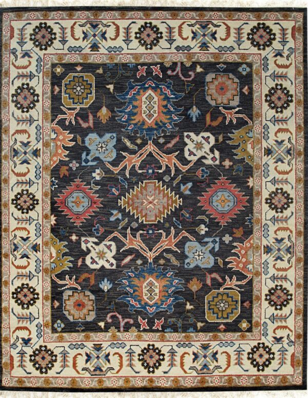 Dark gray area rug featuring a traditional multicolored pattern and ivory floral borders.