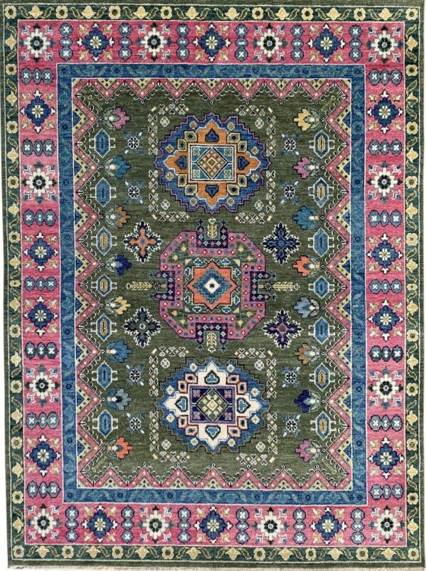 Olive green tribal rug with central medallions and a wide fuchsia pink and blue border.