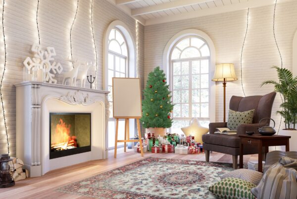 Traditional cream and red patterned rug beneath a festive room scene with a fireplace and christmas tree.