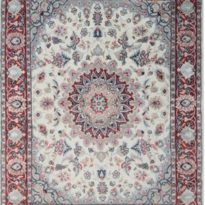 Low-pile traditional rug with an ivory field, featuring red, gray, and blue floral motifs and a deep red border.