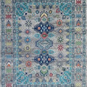 Distressed gray rug featuring a bright tribal medallion design and multiple borders in teal and navy blue.