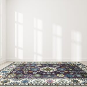 A deep purple geometric patterned rug rests on pale wood floors in a brightly lit white room.