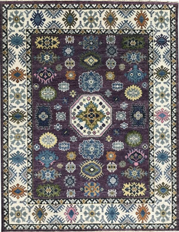 Traditional purple rug with scattered multi-color designs framed by a wide cream and stylized indigo border.